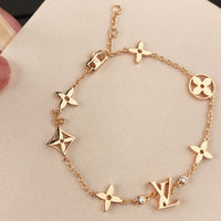 [Bieber Jewelry ]STAR AND SUN 7 MOTIFS GOLD BRACELET
